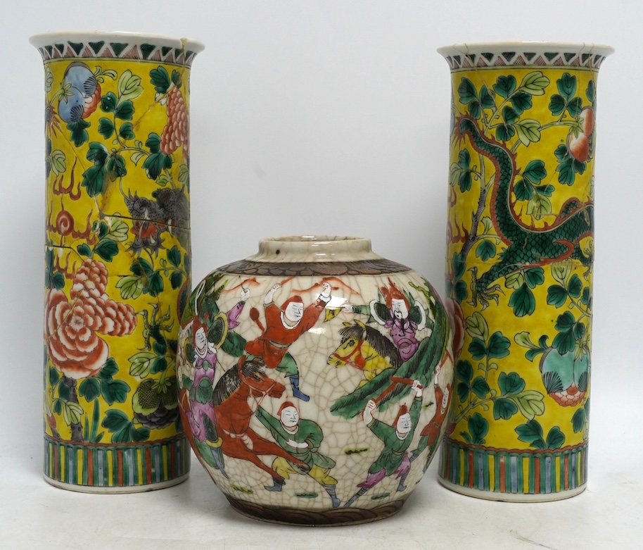 Two pairs of Chinese famille verte sleeve vases, a similar crackle glazed vase and jar, and a famille rose vase and cover, 19th century and later, tallest 29.5cm. Condition - poor